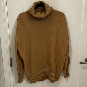 A new day tan turtleneck sweater. Tight knit. Perfect for work! Size medium